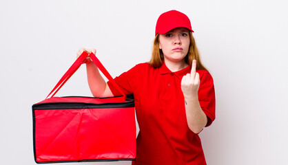 red head pretty woman feeling angry, annoyed, rebellious and aggressive. pizza delivery concept