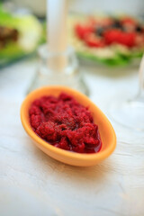 sauce with red horseradish on the festive table