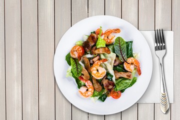 Salted tasty fresh salad with fresh green vegetables. Ketogenic, keto or paleo diet lunch bowl.