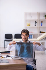 Young male doctor radiologist working in the clinic