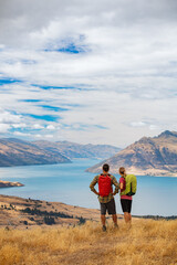 Fototapeta na wymiar Lake Wakatipu couple walking on their travel holiday