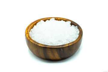Coarse salt in wooden bowl isolated on white background