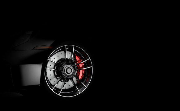 Wheel of a sport car in the dark