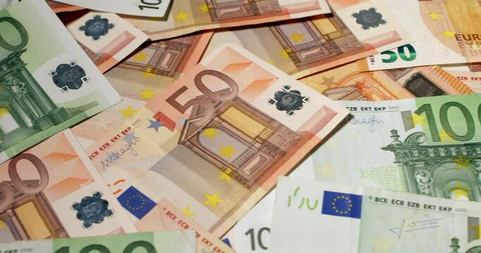 Fifty and one hundred Euro banknotes. European monetary union currency