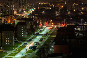 Night panorama of Light in the windows of a multistory building. life in a big city