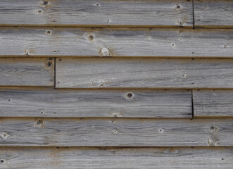 Full frame, close up of light brown, greige wooden horizontal planks texture. Background or backdrop