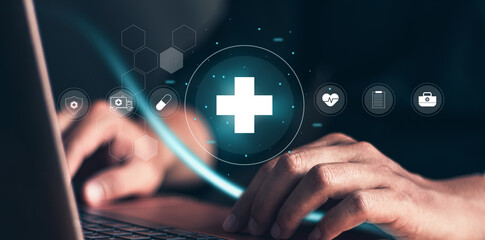 medical network healthcare concept with virtual innovation healthcare icon. businessman using laptop for online healthcare.