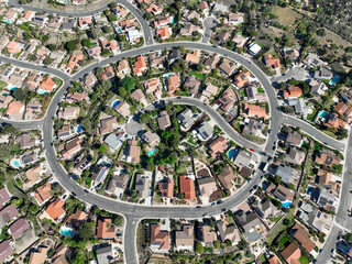 Aerial top view of middle class neighborhood with villas in South California, USA