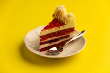 delicious piece of red velvet cake with chocolate and cream