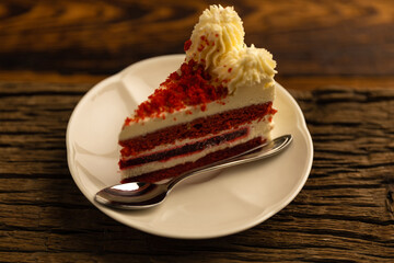 red velvet desert on top of antique wooden chopping board