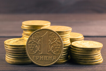 Ukrainian hryvnias, stack of coins. Ukrainian steel coin denominations of 1 hryvnia