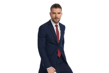 sexy fashion model posing with his legs spread out