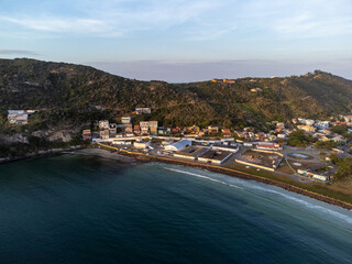 Arraial do Cabo, Rio de Janeiro, Brazil - red sunrise of wonderful paradise beach with white sands and turquoise water