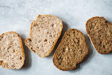 Slices of rye and whole wheat bread. Top view. - 495528515