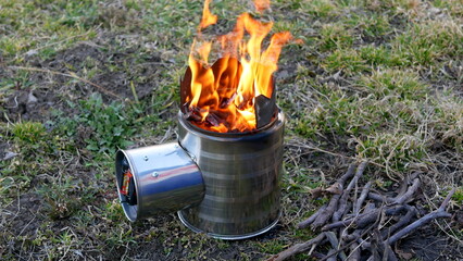 A portable wood-burning stove with air blower