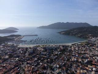 Arraial do Cabo, Rio de Janeiro, Brazil - red sunrise of wonderful paradise beach with white sands and turquoise water