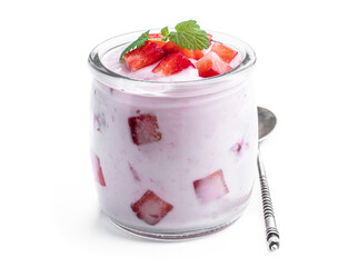 Homemade strawberry yogurt with fresh sliced berries isolated on white