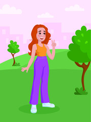 a red-haired cute girl in a city park. a walk in the fresh air