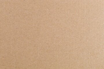 High-quality light brown cardboard - as a material for creativity or packaging. Recycled paper, environmentally friendly raw materials. Fiber texture or background