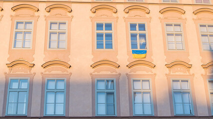 Prague, Czech Republic - 03.28.2022: An Ukrainian flags is hung in support of Ukrainians protecting their country from russians.