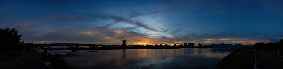 Naklejka premium Sunset river landscape along the Dadaocheng area