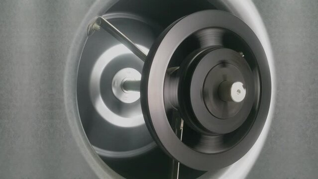 Rotating belt pully on a large ventilation fan scroll air conditioning unit