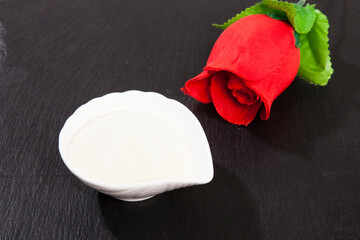 Collagen powder, on black background.