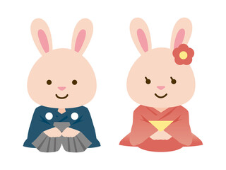 着物を着て正座をする2匹のうさぎ