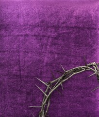 Christian crown of thorns with metal nails on a wooden desk - obrazy, fototapety, plakaty