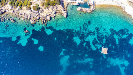 Fototapeta na wymiar An immaculate blue sea and cove,.Karaburun - Balikliova - Izmir - Turkey. Top view with drone.