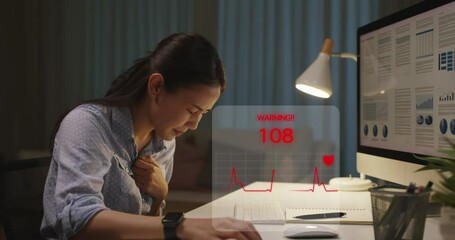 Smartwatch wearable computer ECG pulse rate heart attack detect and warning IOT AI app to medtech system. Save life online alert health care gadget in asia people young woman work late night at home.
