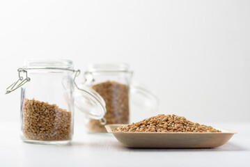 Whole wheat seedl on white background. Natural product, healthy baking ingredient