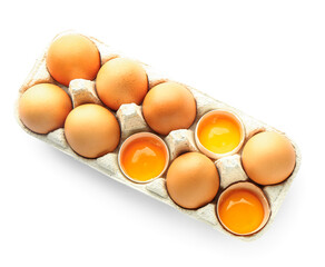 Holder with fresh chicken eggs on white background