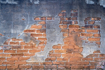 Brown brick wall background. Dark grey cement wall texture.