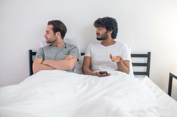 Fototapeta premium Offended male ignoring his partner after the conflict