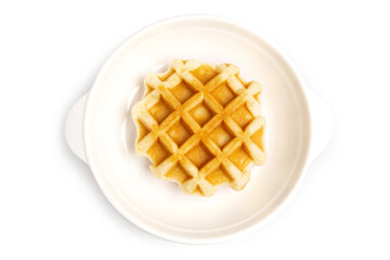 Closeup of Freshly Baked Round Butter Waffle, Belgian breakfast pastry dessert, isolated on white background. Clipping path.	
