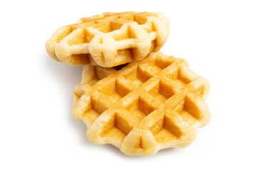 Closeup of Freshly Baked Round Butter Waffles, Belgian breakfast pastry dessert, isolated on white background. Clipping path.	
