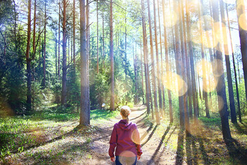 spring forest female windbreaker trekking, springtime rest nature landscape background woman tourist © kichigin19