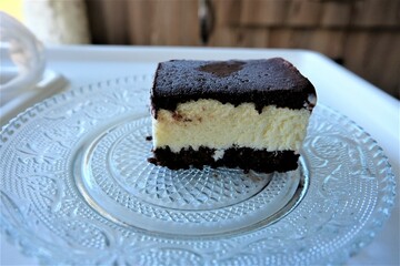 Dairy free ice cream in a container, selective focus. Pieces of ice cream cake with vanilla and cocoa. It is called "Dondurma" or "Dondurma Sandvic" in Turkish. Summer food.