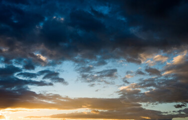 Obraz premium Light in the dark storm clouds