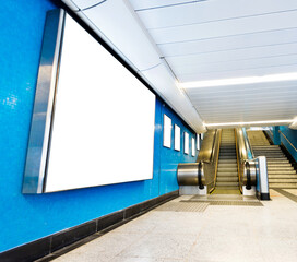 Blank billboard in underground hall