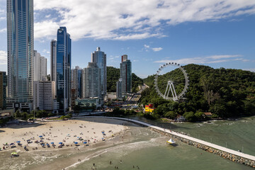 Aerial of Balneário Camboriú city and famous Ferris wheel of Balneário Camboriu, Brazil. The Big...