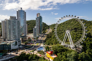 Aerial of Balneário Camboriú city and famous Ferris wheel of Balneário Camboriu, Brazil. The Big...