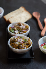Cooked food served in bowl. Close up, selective focus.