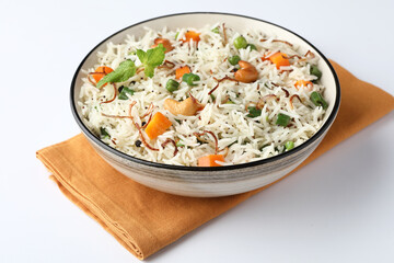 Indian veg biryani, veg pulav, Indian vegetable pulav, Biriyani, vegetable Biriyani served in a ceramic bowl