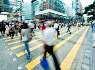 Crowd of people walking on busy hong kong street - obrazy, fototapety, plakaty