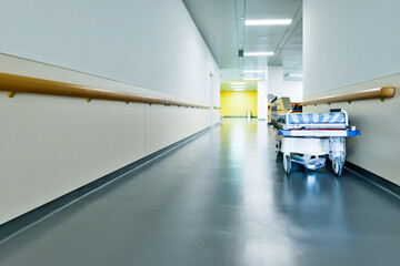 Empty hospital hallway with surgical transport equipment