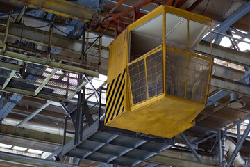 Yellow cradle at the factory. Close-up.