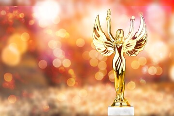 Fototapeta premium Hollywood Golden Academy award statue on fireworks background. Success and victory concept.