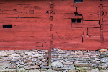 Old red weathered wooden barn